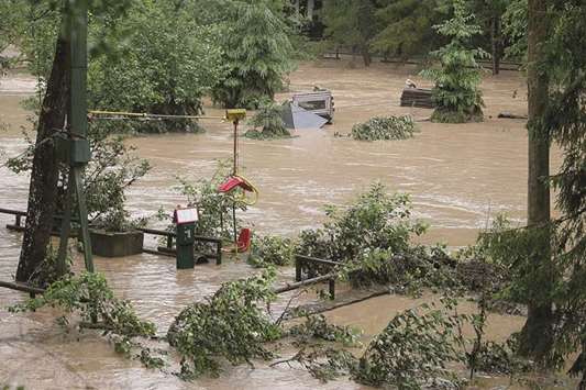 The zoo in Luenebach, western Germany, is flooded following heavy rainfall in the southern and western parts of the country. Two lions, two tigers and a jaguar were initially thought to have escaped from the zoo, sparking a massive hunt.
