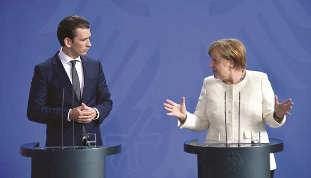 Merkel and Kurz at the press conference at the Chancellery in Berlin.