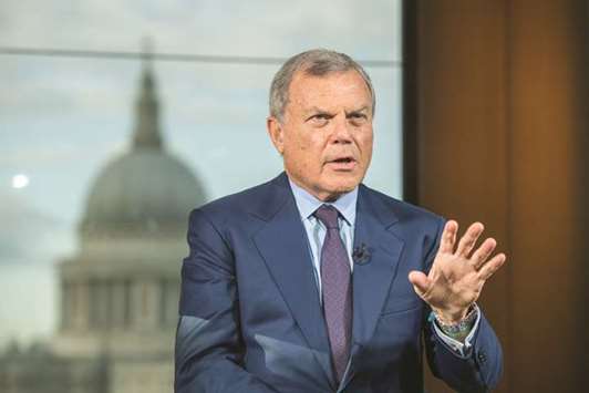 Martin Sorrell, former CEO of WPP, gestures while speaking during a Bloomberg Television interview in London. Sorrell was allowed to leave the company with share awards worth millions of pounds intact and without a non-compete clause, rekindling arguments that have dogged previous annual meetings u2014 that WPP paid Sorrell too much and did not prepare for his departure.