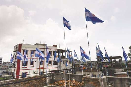 This photograph shows national flags of Argentina installed on a rooftop on the outskirts of Dhaka.