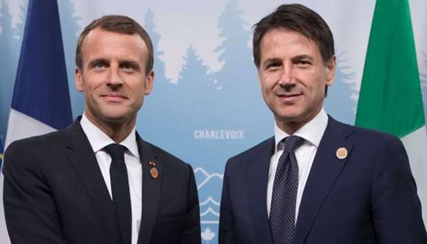 French president Emmanuel Macron (L) with Italian Prime Minister Giuseppe Conte