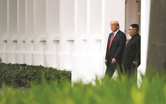 US President Donald Trump and North Korean leader Kim Jong-un walk after lunch at the Capella Hotel on Sentosa Island in Singapore on June 12. Pristine coastline isnu2019t North Koreau2019s only untapped asset. The country boasts vast stores of minerals, including iron and rare earths, which could be worth $6tn, according to a 2013 estimate by the North Korea Resources Institute in Seoul.