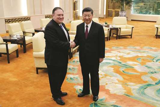 US Secretary of State Mike Pompeo shakes hands with Chinese President Xi Jinping at the Great Hall of the People in Beijing, China, yesterday.