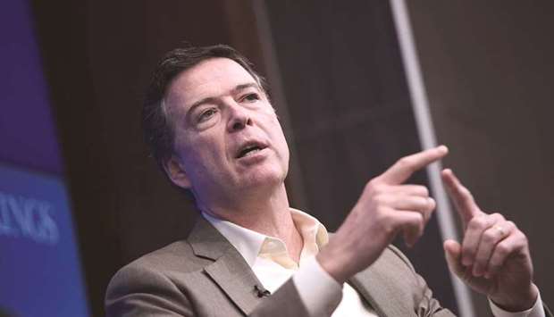 Comey: criticised for violating  Justice Department policies.