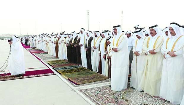 His Highness the Amir Sheikh Tamim bin Hamad al-Thani performs Eid Al Fitr prayer with citizens at Al Wajba praying area.