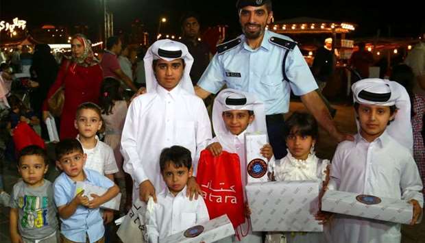 Children received gifts at Katara.