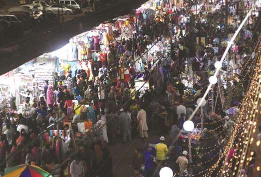 Residents shopping at a market in Karachi this week ahead of the Eid.