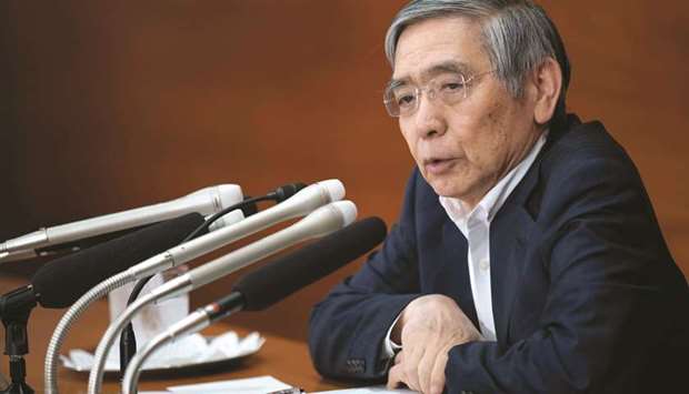 Bank of Japanu2019s governor Haruhiko Kuroda speaks during a press conference about the monetary policy in Tokyo yesterday. Kuroda defended a decision to continue the countryu2019s ultra-loose monetary policy, even as the US Federal Reserve and European Central Bank tighten their policies.