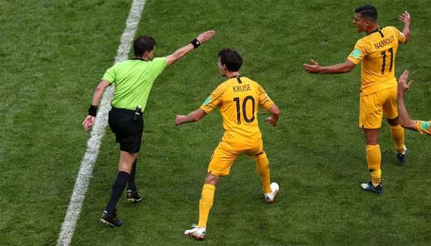 Referee Andres Cunha awards a penalty to France after VAR (Video Assistant Referee) review