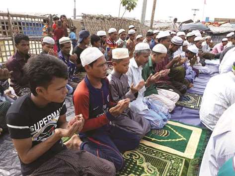 Rohingya Muslims offer Eid al-Fitr prayers at a camp mosque in Coxu2019s Bazar yesterday.