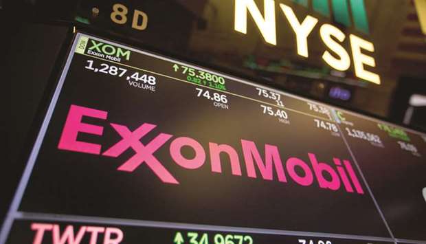 A monitor displays Exxon Mobil signage on the floor of the New York Stock Exchange on March 12, 2018. Exxonu2019s shares are down 2% over the past three years even as Brent crude, the international benchmark, has climbed 19%.