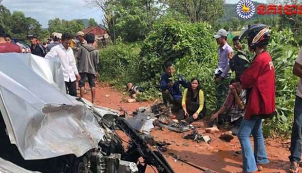 People gather at the site of an accident in Preah Sihanouk province on Saturday. Picture: Twitter