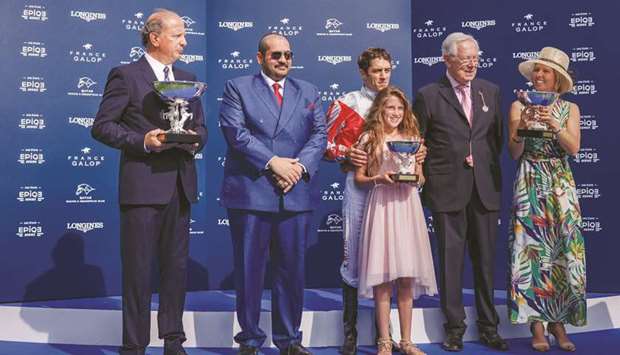 Qatar Racing and Equestrian Club general manager Nasser Sherida al-Kaabi (second from left) with the winners of the Qatar Derby des Pur-Sang Arabes des 4ans in Chantilly, France, yesterday. (Scoopdyga)