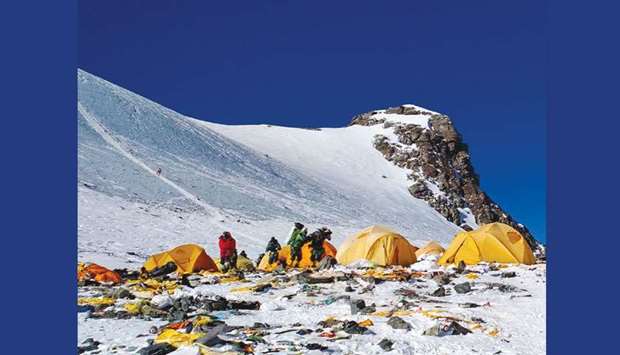 Discarded climbing equipment and rubbish scattered around Camp 4 of Mount Everest.