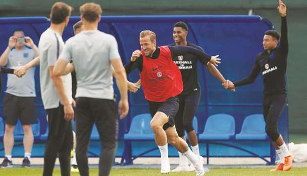 Englandu2019s Harry Kane trains with teammates Jesse Lingard and Marcus Rashford during their training session in Saint Petersburg, Russia, yesterday. (Reuters)