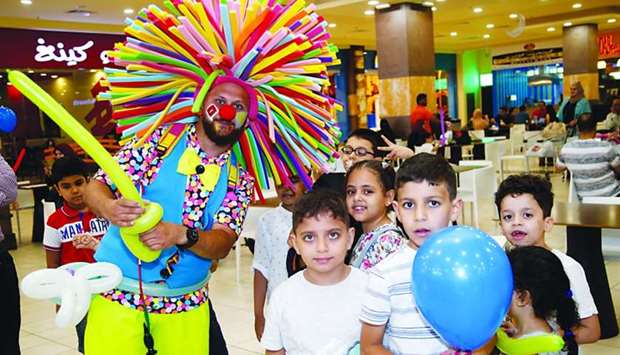 A performer entertains children at Dar Al Salam Mall. PICTURE: Jayaram