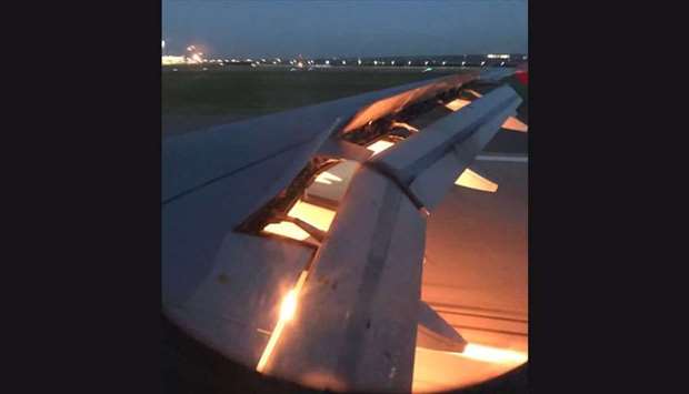 Videos shared on social media appeared to show an aircraft that posters identified as the Saudi team's plane with its wing on fire while it was in the air.