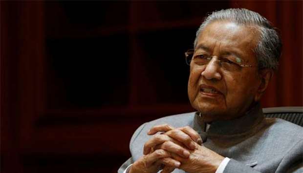 Malaysia's Prime Minister Mahathir Mohamad speaks during an interview with Reuters in Putrajaya on Tuesday.