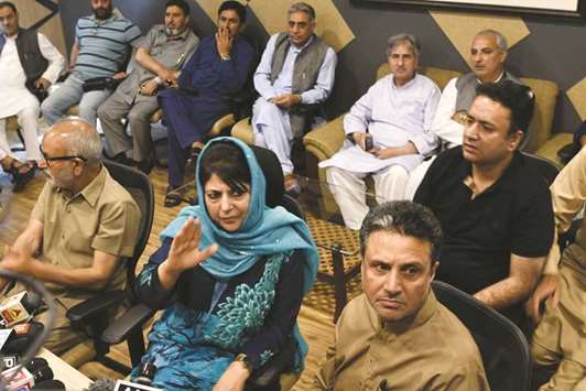 Mehbooba Mufti speaks during a press conference after submitting her resignation in Srinagar yesterday.
