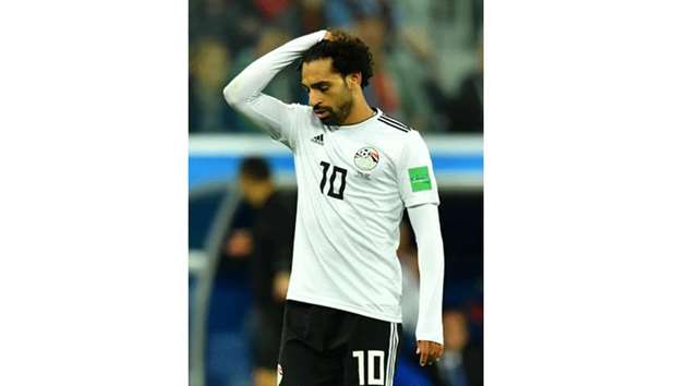Egyptu2019s Mohamed Salah looks dejected after the match against Russia yesterday.