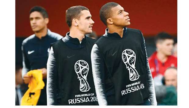 Franceu2019s Antoine Griezmann (left) and teammate Kylian Mbappe attend a training session in Ekaterinburg yesterday. (AFP)