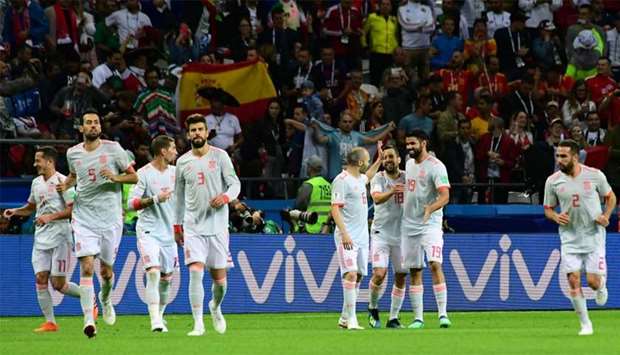 Spain's forward Diego Costa (2nd R) celebrates his goal with teammates during the match against Iran