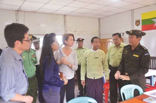 UN Special Envoy to Myanmar Christine Schraner Burgener (fifth right) meeting Myanmar immigration officer, right, and local officials at a processing centre for Rohingya refugees in Maungdaw district close to the border of Bangladesh.