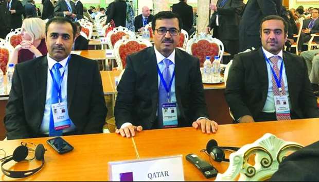 HE the Minister of Energy and Industry Dr Mohamed bin Saleh al-Sada is flanked by Kahramaa president Essa bin Hilal al-Kuwari and another official at the conference in Dushanbe