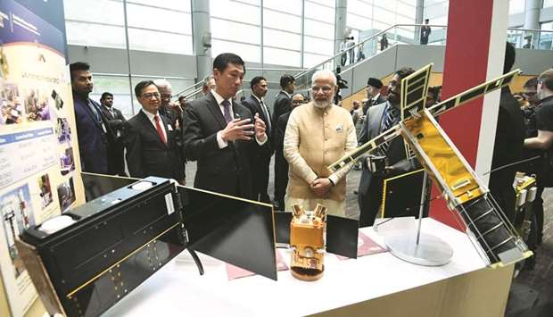 Indian Prime Minister Narendra Modi visits the Nanyang Technological University in Singapore yesterday. Modi said that while Singapore is a significant source of foreign direct investment for India, the southeast Asia city state is also a top  destination of Indian investments.