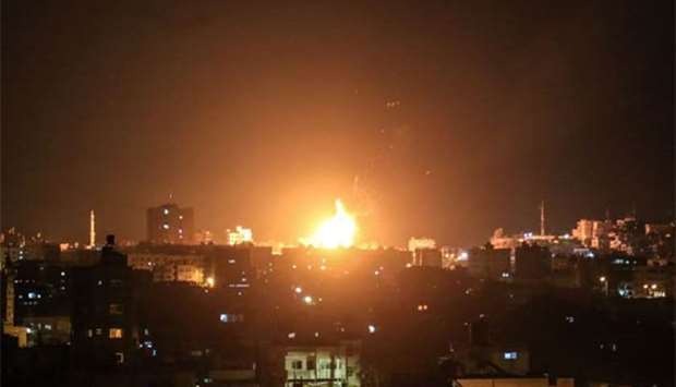 An explosion is seen in Gaza City after an airstrike by Israeli forces on Wednesday.