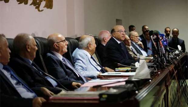 Judge Medhat al-Mahmoud, presiding over the supreme court, reads a verdict on appeals concerning amendment of an election law in Baghdad on Thursday.