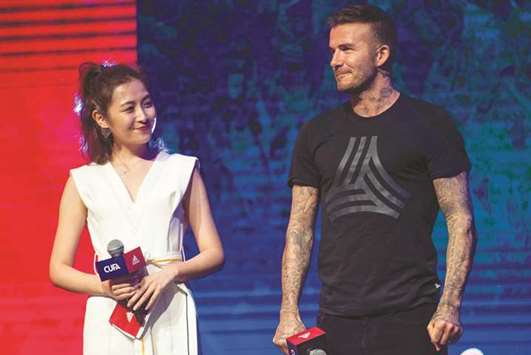 Former England footballer David Beckham attends an event for a sportswear company in Beijing.