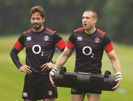 England Fly-half Danny Cipriani (left) with teammate Mike Brown during a training  session. (AFP)