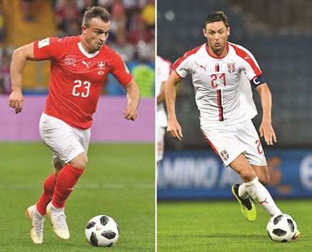 Switzerlandu2019s forward Xherdan Shaqiri (left) and Serbiau2019s Nemanja Matic. (AFP)