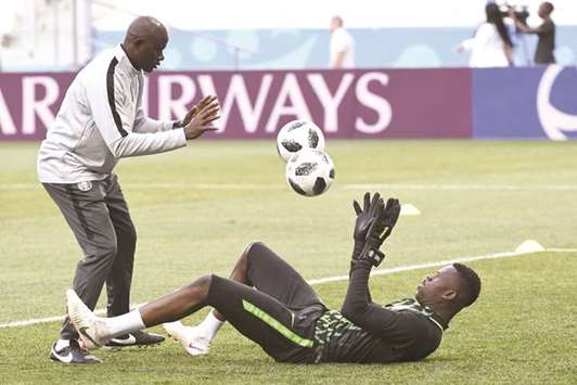 Nigeriau2019s goalkeeper Francis Uzoho (right) attends a training session in Volgograd yesterday. (AFP)