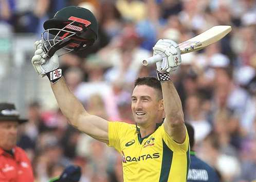 Australiau2019s Shaun Marsh celebrates his century during the fourth ODI against England at The Riverside in Chester-le-Street, England yesterday. (AFP)