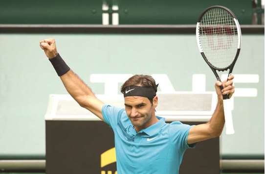 Switzerlandu2019s Roger Federer celebrates winning against Benoit Paire of France during their ATP tournament in Halle, Germany, yesterday. (AFP)