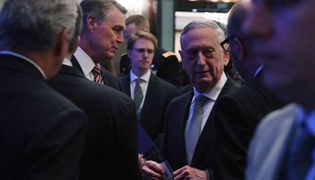 US Defence Secretary James Mattis talks to delegates before delivering his first plenary session of the 17th Asian Security Summit of the IISS ShangriLa Dialogue in Singapore.