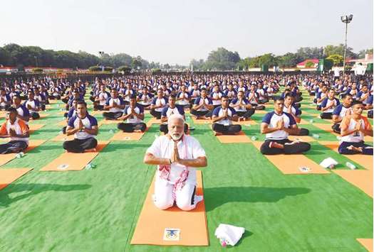 Prime Minister Narendra Modi taking part in a yoga session to mark International Yoga Day in Dehradun, Uttarakhand.