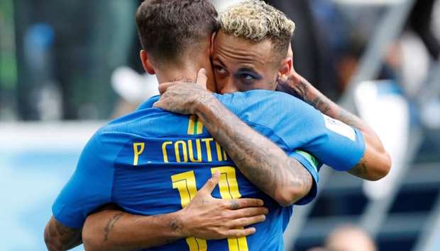 Brazil's Neymar celebrates scoring their second goal with Philippe Coutinho