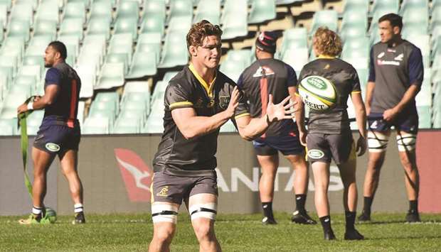 Australiau2019s rugby team captain Michael Hooper (left) attends the captainu2019s run training session in Sydney, ahead of their deciding Test against Ireland today. (AFP)