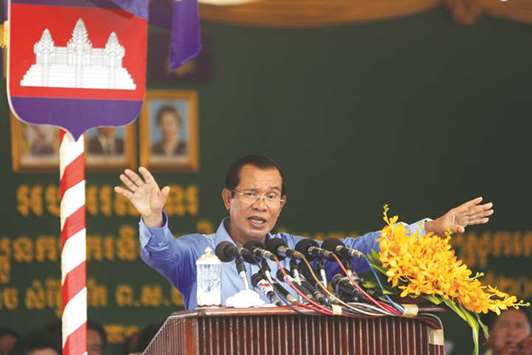 Cambodiau2019s Prime Minister Hun Sen attends a rally with garment workers in Kandal province.