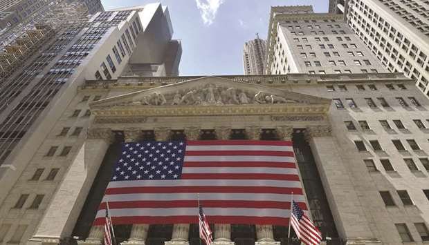 The New York Stock Exchange building in Wall Street, downtown Manhattan in New York City. An overhauled telecommunications sector featuring most of the so-called FANG stocks could debut as Wall Streetu2019s hottest bet when it kicks off in September, boosted by a rising wave of media and television acquisitions.