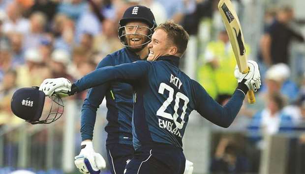 Englandu2019s Jason Roy (right) celebrates his century with Englandu2019s Jonny Bairstow during the fourth One Day International (ODI) against Australia at The Riverside in Chester-le-Street on Thursday. (AFP)
