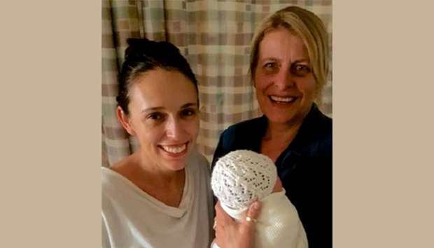 New Zealand Prime Minister Jacinda Ardern is seen with her baby girl and midwife Libby at Auckland City Hospital.
