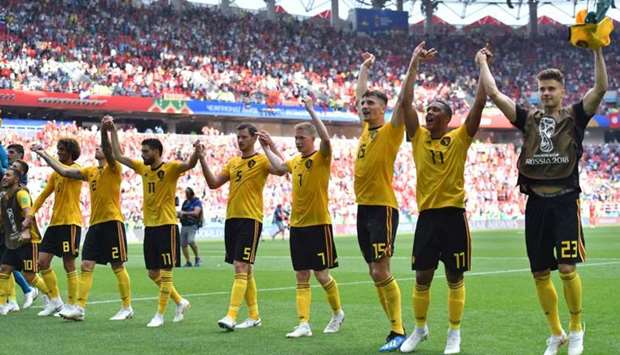 Belgium's players celebrate at the end of the Russia 2018 World Cup Group G football match between Belgium and Tunisia