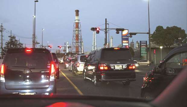 Vehicles drive past the Cosmo Oil Co refinery at the Yokkaichi industrial complex at dusk in Yokkaichi, Mie Prefecture (file). Japan, Asiau2019s fourth-largest buyer of Iranian supplies, received 5.3% of its oil requirements from Iran, or 172,000 bpd, in 2017, according to data from the Asian nationu2019s Ministry of Economy, Trade and Industry.