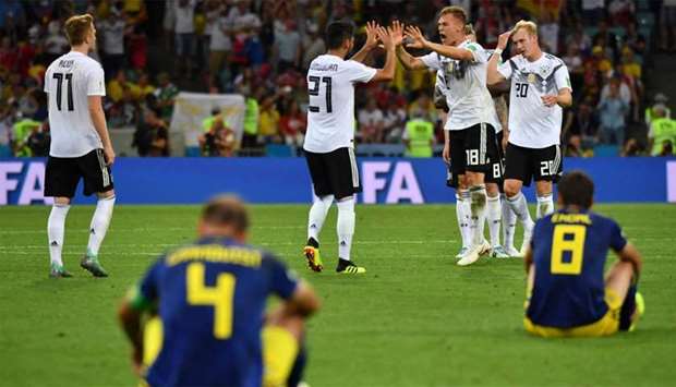 Germany's palyers celebrate their second goal during the Russia 2018 World Cup Group F football match between Germany and Sweden