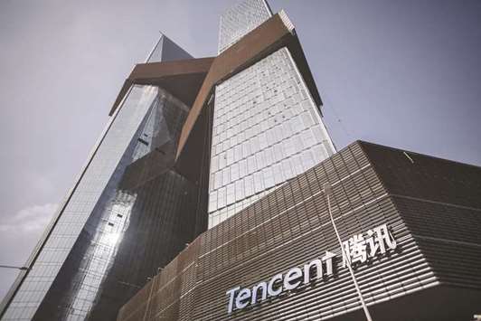 Tencent Holdings headquarters in Shenzhen, China. Tencent is joining forces with a finance startup to create a system for over-the-counter bond deals, banking on its appeal to the army of traders that already rely on its popular messaging services.