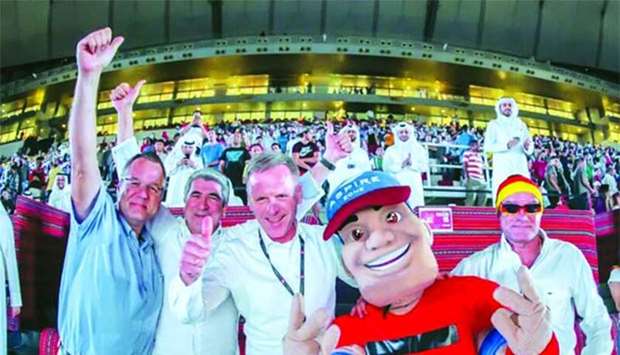 German ambassador Hans-Udo Muzel and other dignitaries at the Khalifa International Stadium's fan zone.